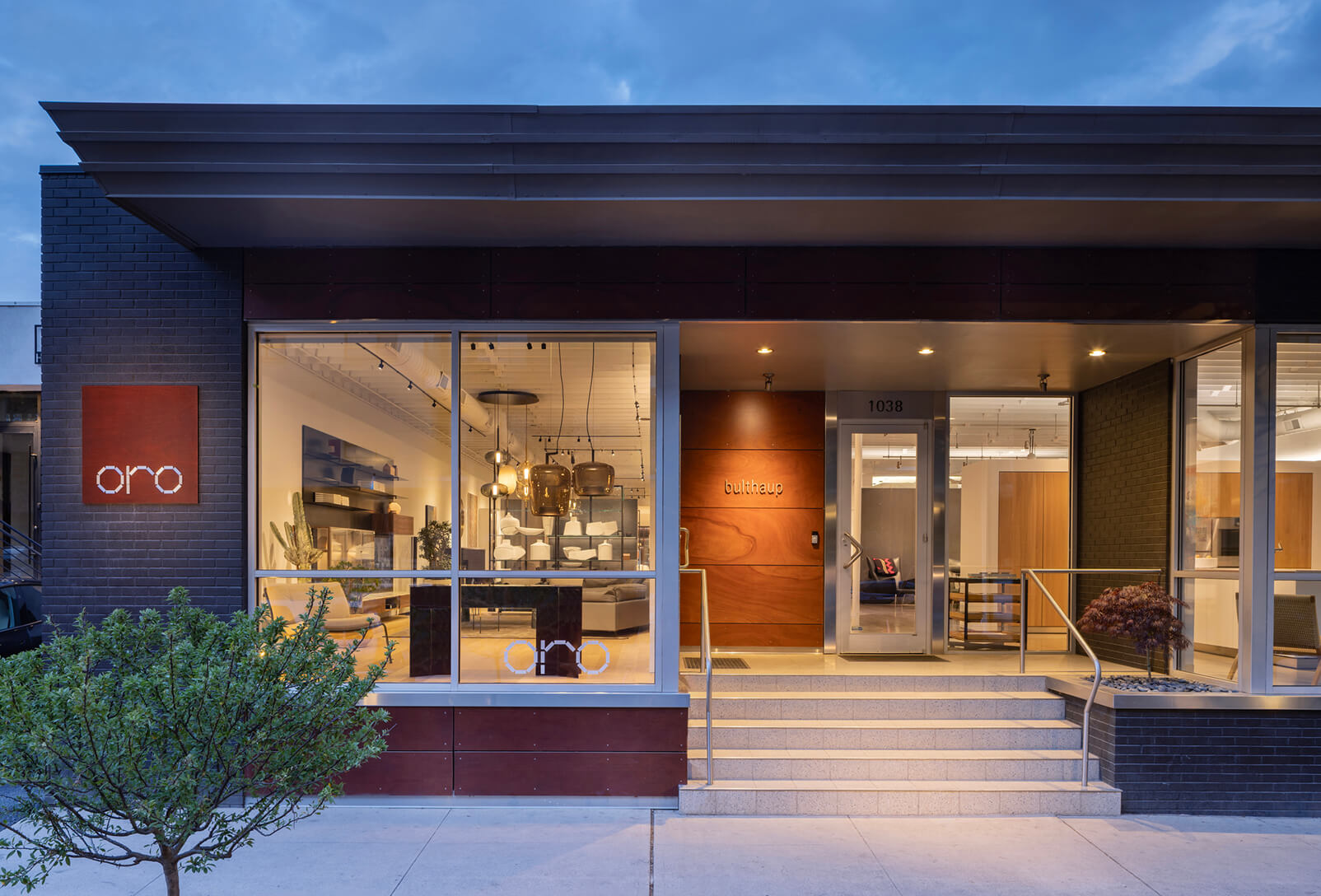 oro showroom exterior entrance bulthaup signage dusk oro showroom lightbox exterior entrance bulthaup signage dusk